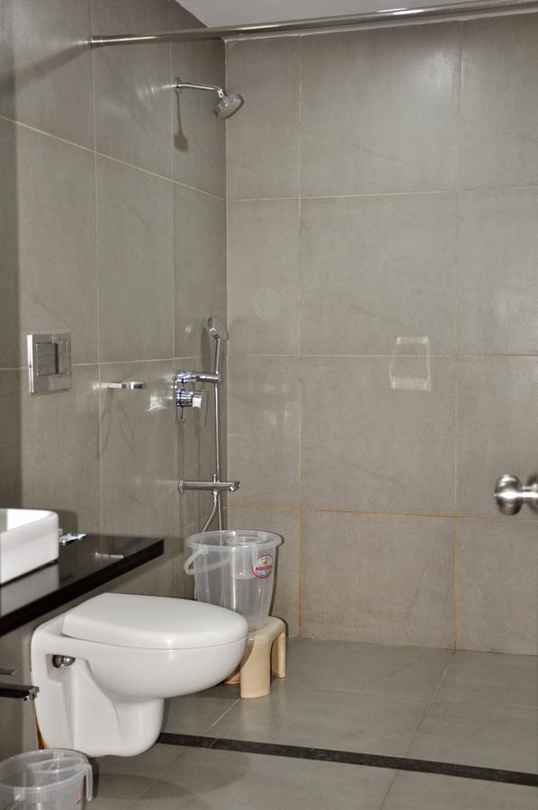 Hotel Tourist, Colhapur Quarto foto